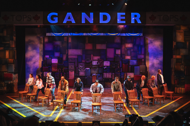 Actors perform in the musical Come From Away